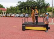 Kapolres Aceh Tamiang Pimpin Pelaksanaan Apel Gelar Pasukan Operasi Lilin Seulawah 2024 Dalam Rangka Pengamanan Nataru