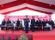 Kapolres Pidie Jaya Pimpin Upacara Penurunan Bendera HUT RI ke-80 di Meureudu