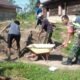 TNI dan Warga Bersatu, Babinsa Koramil 08/Rantau Pimpin Pembangunan Rabat Beton