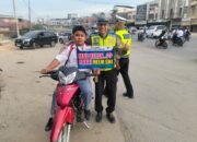 satlantas polres Aceh Tamiang berikan himbauan keselamatan saat jam berangkat sekolah