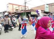 Polsek Seruway Kawal Karnaval dan Lomba Senam, Semarak HUT Ke-81 RI Berlangsung Aman dan Kondusif