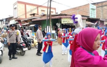 Polsek Seruway Kawal Karnaval dan Lomba Senam, Semarak HUT Ke-81 RI Berlangsung Aman dan Kondusif