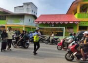 Pastikan Zona Aman Sekolah Lancar Dan Tertib, Sat Lantas Polres Aceh Tamiang Lakukan Pengaturan Arus Lalulintas