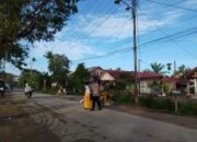 Polri Hadir untuk Masyarakat, Polsek Rantau Pastikan Arus Lalu Lintas Depan SDN 1 Alur Cucur Aman